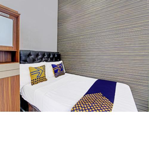 SPOT ON 91523 Kenari Guesthouse