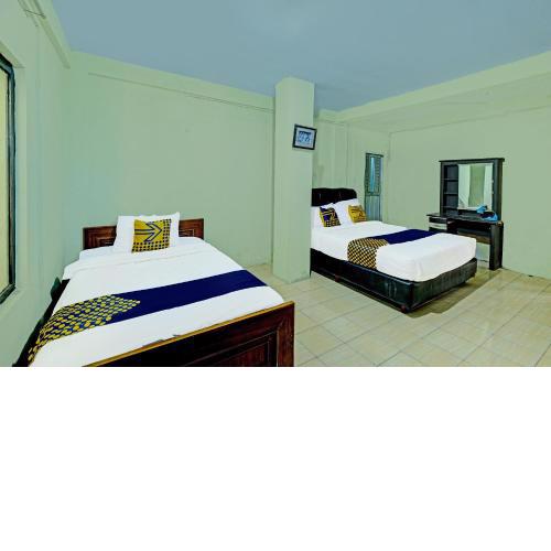 SPOT ON 91540 Ukuh Guesthouse