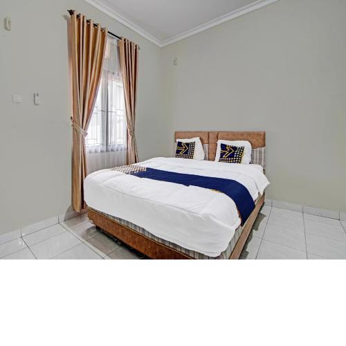 SPOT ON 91645 Rifki Homestay Syariah