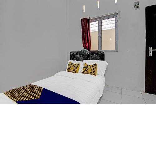SPOT ON 91699 Homestay Hj Lela Syariah