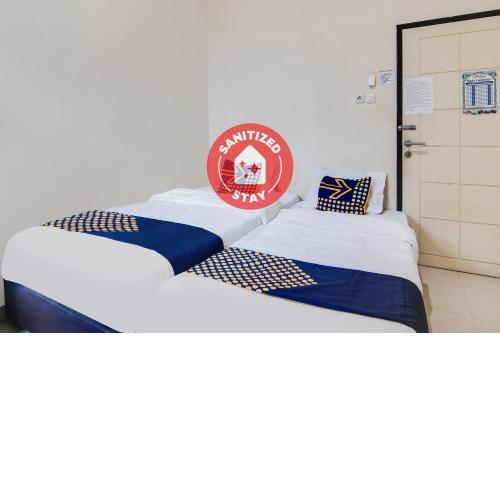 SPOT ON 91772 Nisrina Homestay Syariah