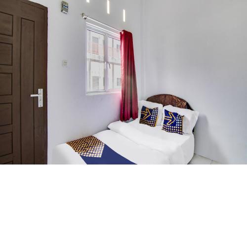 SPOT ON 91858 Raja Homestay Syariah