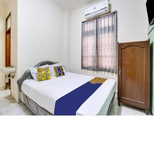 SPOT ON 91908 Hotel Wigati