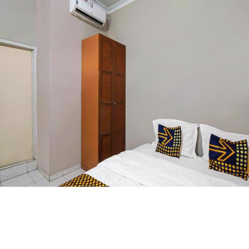 SPOT ON 91958 Flamboyan 25 Homestay Syariah