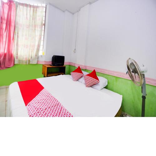 SPOT ON 91968 Penginapan Saweri Gading