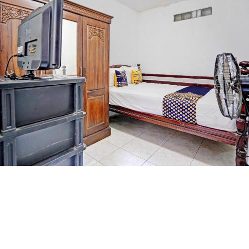 SPOT ON 92595 Umi Homestay Syariah