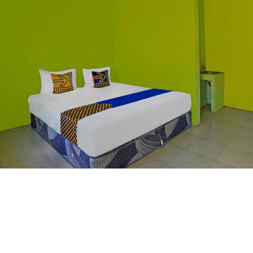 SPOT ON 92669 Guesthouse Prima Syariah