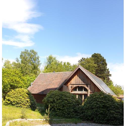 Stallgebäude am Wasserturm - loftähnliches Ferienhaus ohne Zimmerwände auf 2 Etagen mit überdachter Terrasse