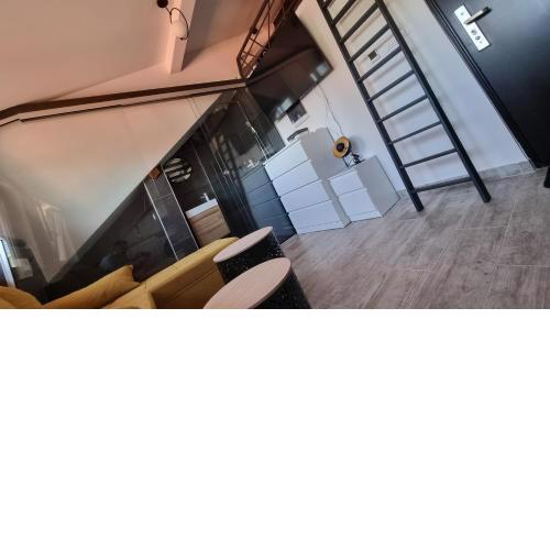 Steep-Climb Attic Studio w AC, Two Beds & 55" TV