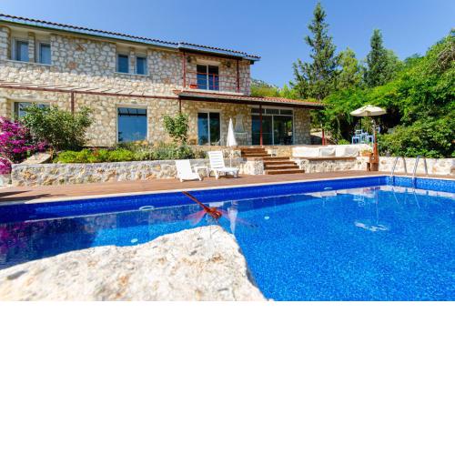 Stone clad Villa La Maison P