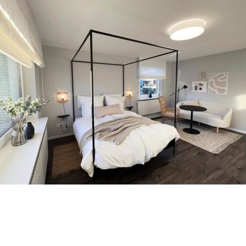Strandnahes gemütliches Design-Apartment mit Balkon und Parkplatz