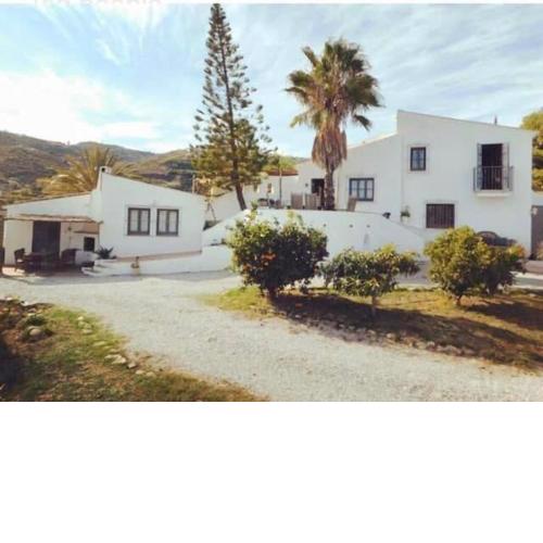 Stunning 3 bed finca with attached 2 bed casita with sea and mountain views