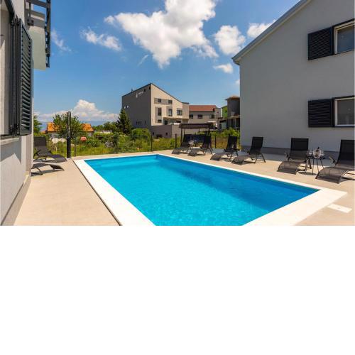 Stunning apartment in Vrbnik with Outdoor swimming pool, WiFi and 2 Bedrooms