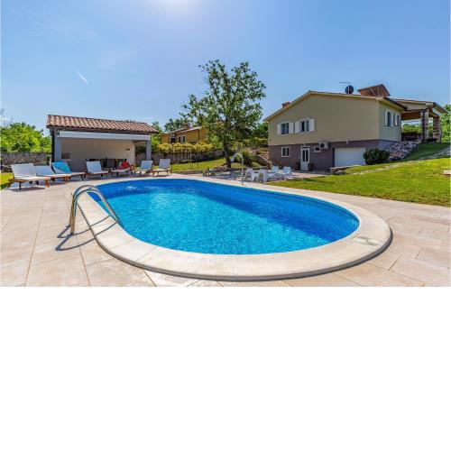 Stunning Home In Marceljani With Outdoor Swimming Pool, Wifi And Heated Swimming Pool