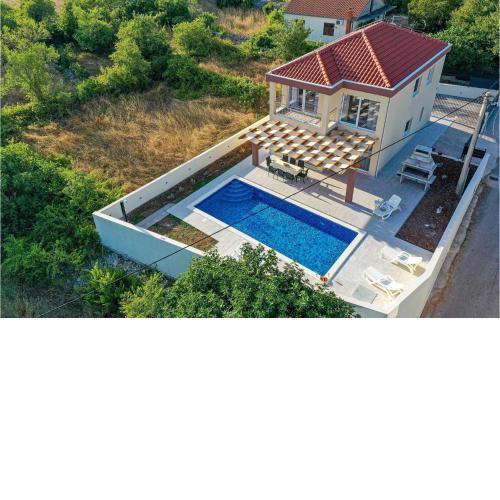 Stunning Home In Primorski Dolac With Outdoor Swimming Pool, Wifi And 4 Bedrooms