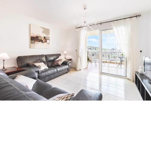 Sunny apartment with ocean and mountains views