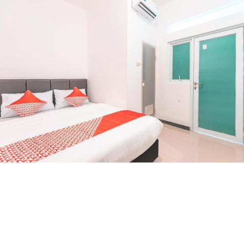 SUPER OYO 2223 J&b Room Utan Kayu