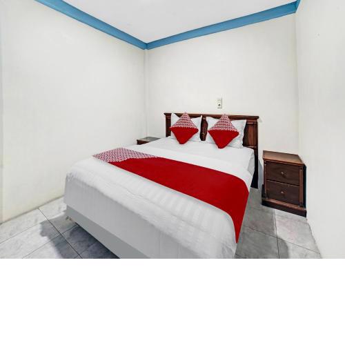 SUPER OYO 90487 Wisma Kuta Karang Baru