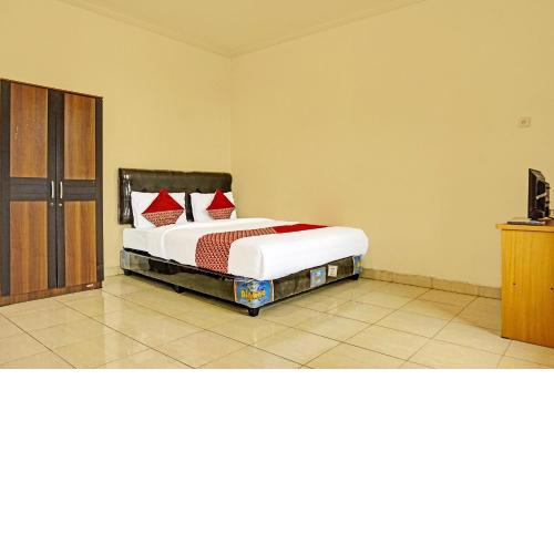 Super OYO 91535 J&b Rooms Tomang