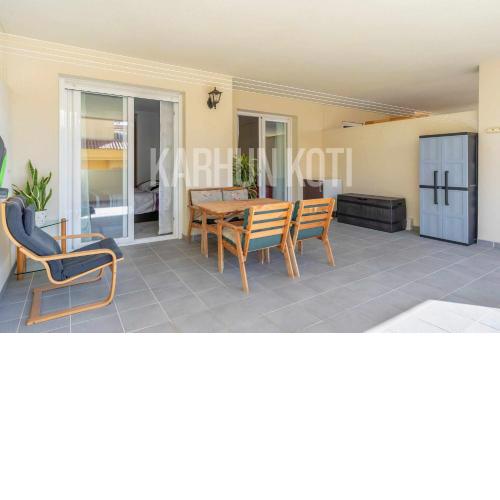 Swimming pool and large terrace in Los Pacos Karhun Koti Rentals