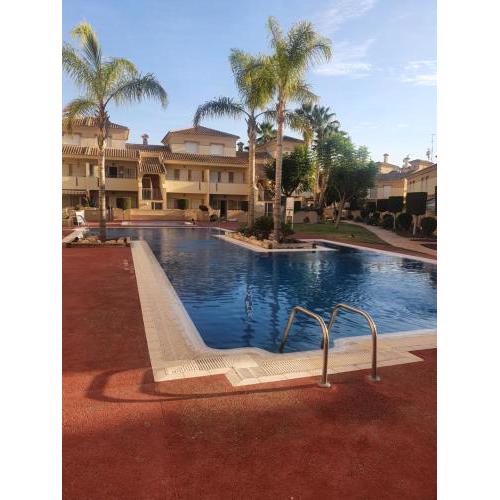 The hideaway a luxury 2 bed apartment a few steps from the pool on Albatros los Alcazares ACmetred Fast wifi