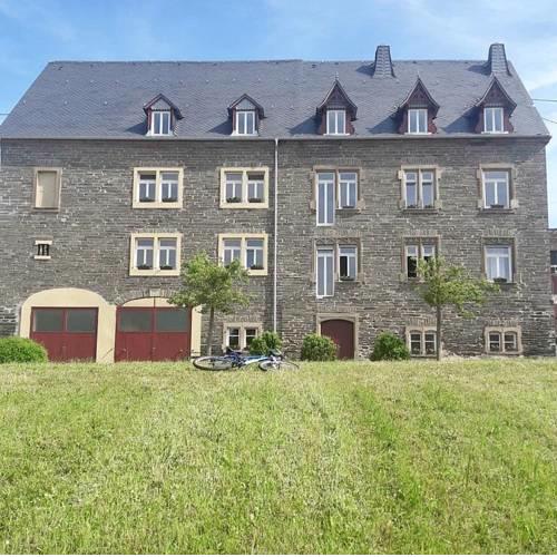 The Old Gemeinde House by the Mosel River