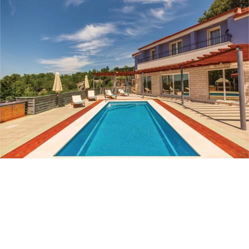 Three-Bedroom Holiday Home in Lovrec