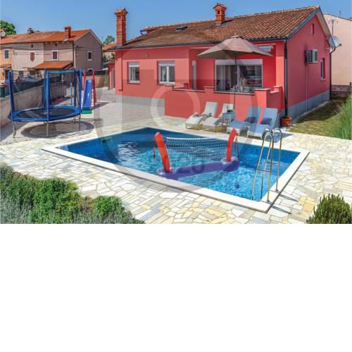Three-Bedroom Holiday Home in Marcana