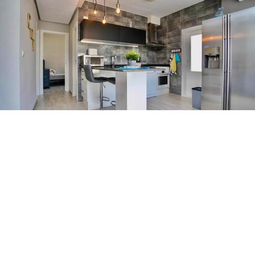 Three bedroom top apartment by the beach