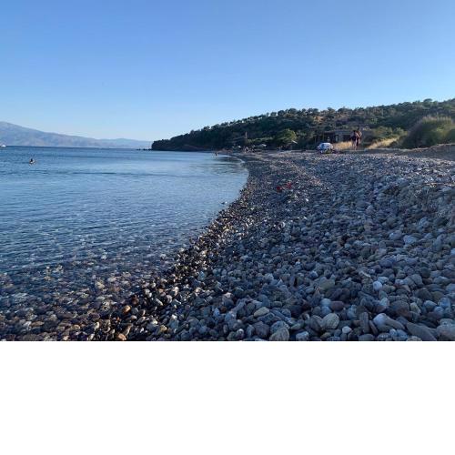 Three small beach hoses nearby the sea with magnificent view of Lesvos