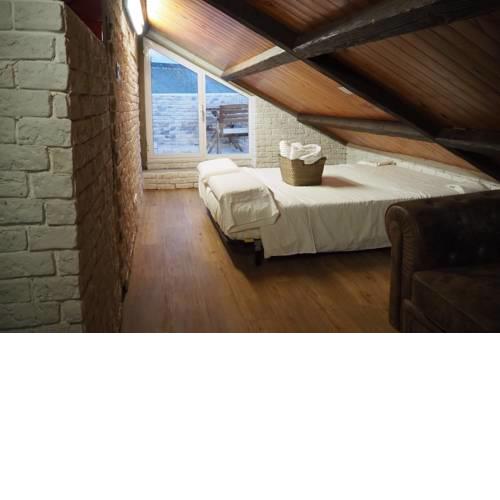 Tiny and cute apartment in the roof touching border