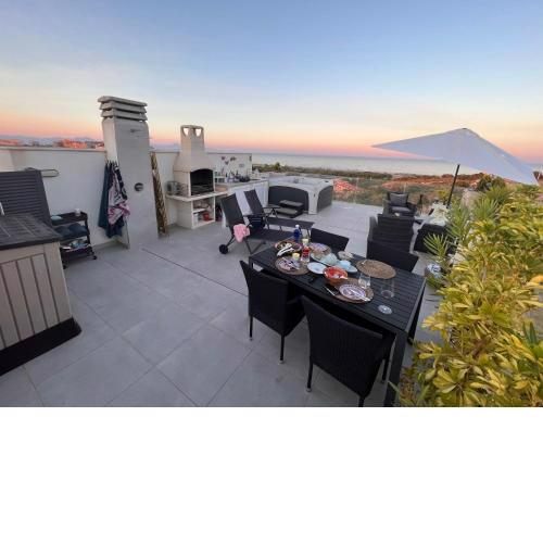 Top-modern apartment close to sea with ocean view and large private terrace