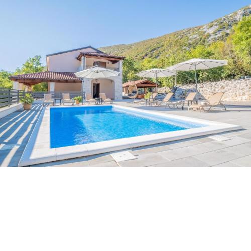 Traditional poolside villa surrounded by nature in Tribalj
