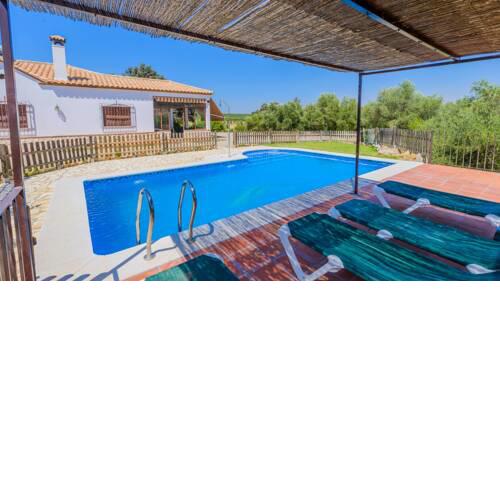 Traditional white villa with large pool and wonderful surroundings