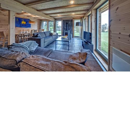traumHaff Küstenchalets - einzigartige Chalets an der Ostsee. Ganz aus Lärchenholz mit Kamin und Sauna