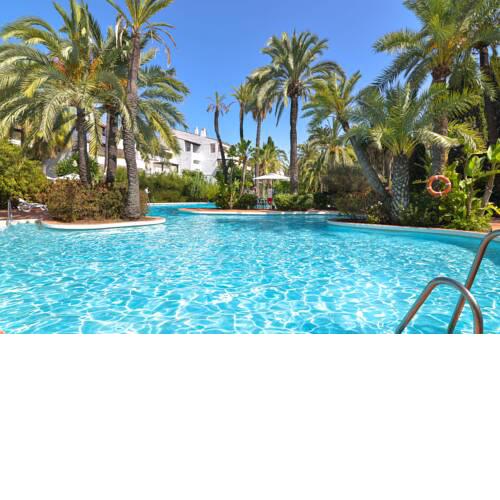 Tropical and modern beachside Penthouse in Puente Romano