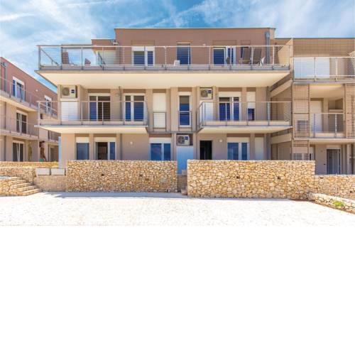 Two-Bedroom Apartment in Povljana