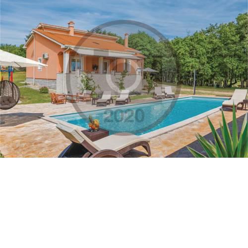 Two-Bedroom Holiday Home in Tinjan
