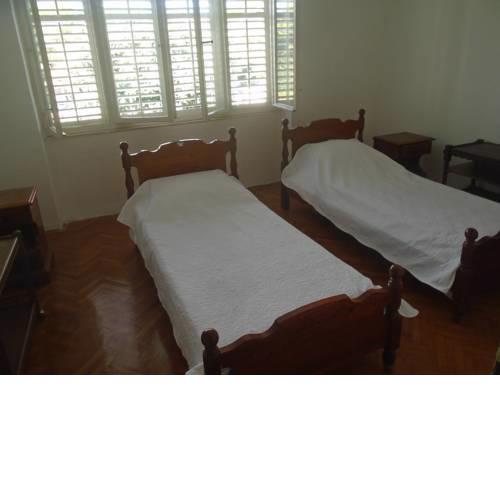 two beds room with bathroom