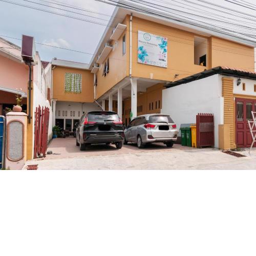 Urbanview Hotel Nisura Homestay Medan