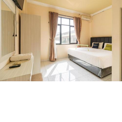 Urbanview Hotel Nugraha Palembang