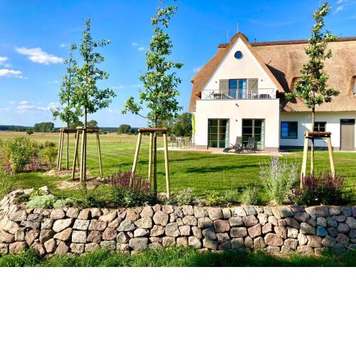 Urlaub de luxe unter Reet - Bach - Inseldomizil Stolpe
