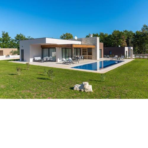 Villa Ariana with a heated pool