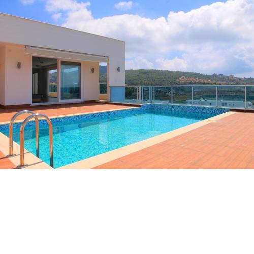 Villa Carlijn met prive-zwembad, veel privacy en panoramisch uitzicht op zee, op luxe resort