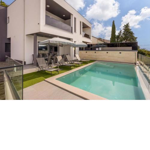 Villa Ewa & Tomi - heated Pool, Jacuzzi & Sea View
