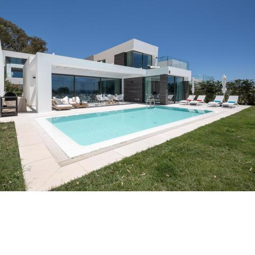 Villa moderne à 700m de la plage avec vue mer