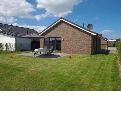 Watt´n Blick - Hundefreundliches Ferienhaus mit Ausblick über die Wiesen bis zum Deich