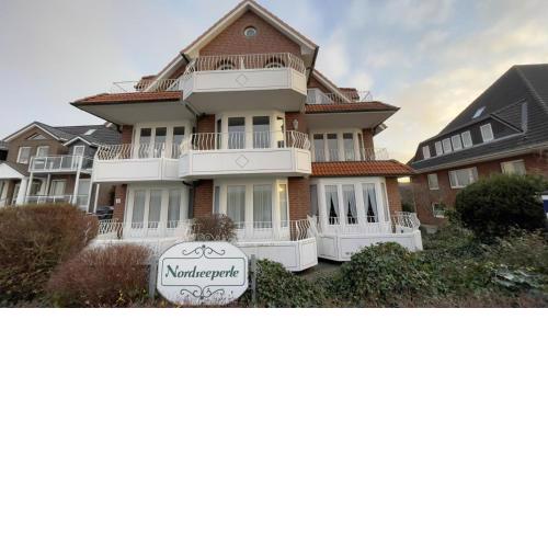 Whg 11 im Haus Nordseeperle - gemütliche Ferienwohnung in direkter Strandlage mit Meerblick