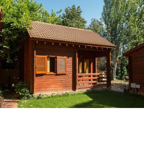 Wooden bungalow with a covered terrace, 1 km from beach