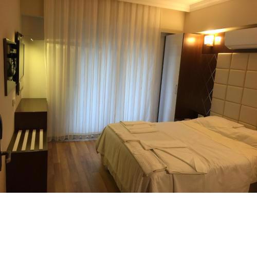 Yuvarlakcay Çınar Butik Otel